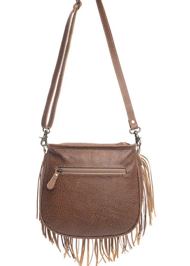 Hand tooled Fringe Bag with leather panel and fringe, showcasing Western craftsmanship.