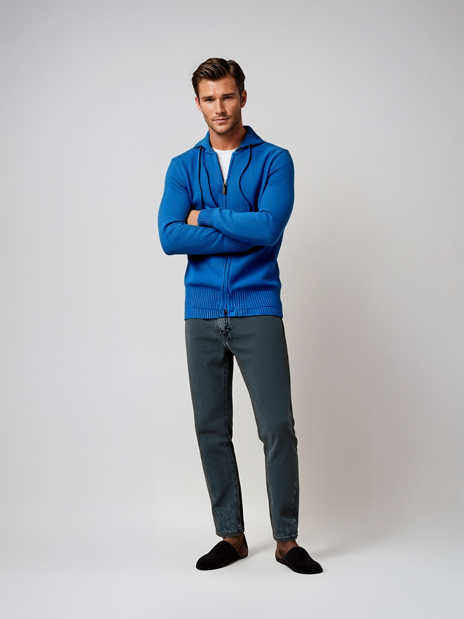 Model wearing Full Zip Cotton/Cashmere Hoodie in blue with zip closure, drawstring hood, and ribbed waistline for stylish casual occasions.
