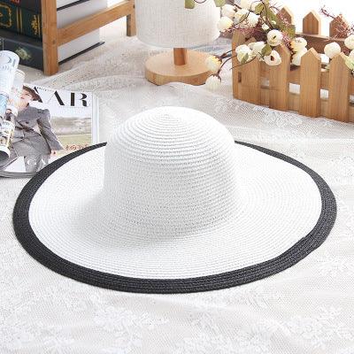 Audrey Hepburn Inspired Sun Hat – Elegant and Stylish for Cowgirl Women with black-and-white striped design.