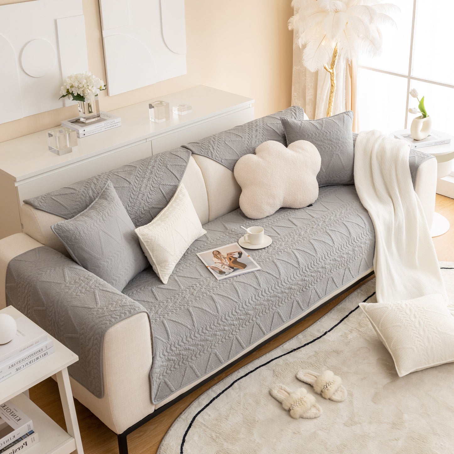 Living room with Geometric Textured Cotton Quilted Sofa Cover, Non-Slip Washable Couch Protector in modern design.