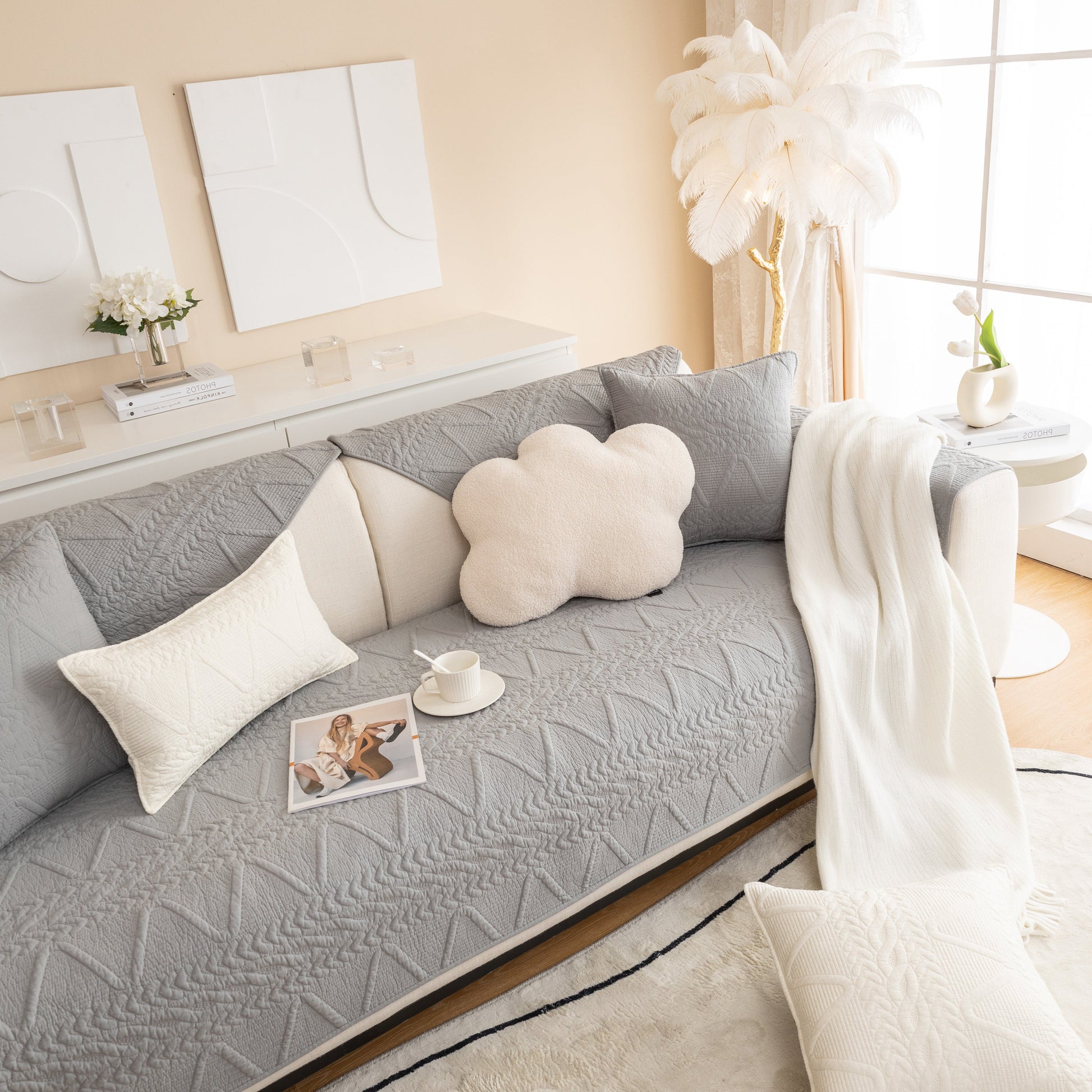 Geometric Textured Cotton Quilted Sofa Cover, Non-Slip Washable Couch Protector in modern living room setting.