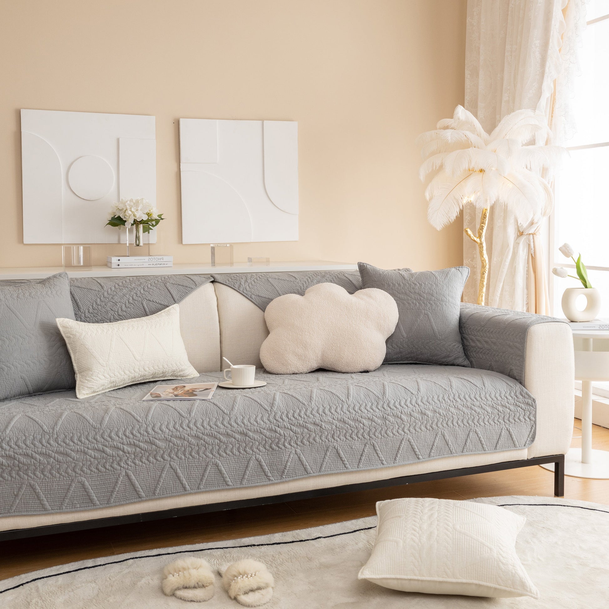 Geometric Textured Cotton Quilted Sofa Cover, Non-Slip Washable Couch Protector in stylish living room setting with decorative pillows