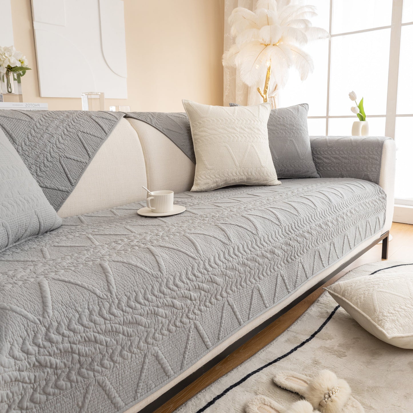 Geometric Textured Cotton Quilted Sofa Cover, Non-Slip Washable Couch Protector in elegant living room setting.