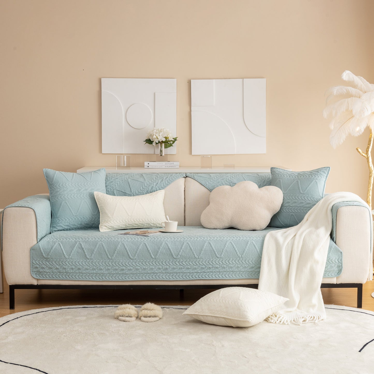 Modern living room featuring a Geometric Textured Cotton Quilted Sofa Cover, Non-Slip Washable Couch Protector in light blue.