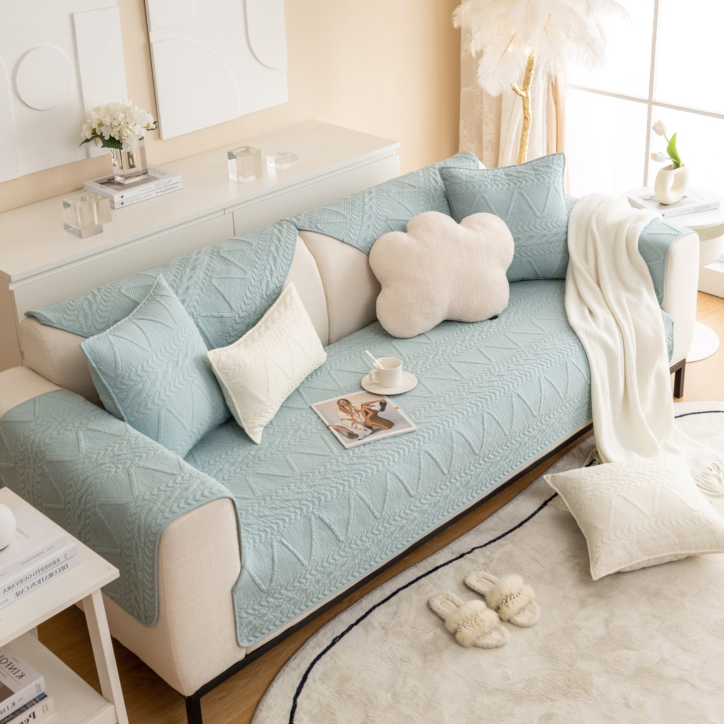 Geometric Textured Cotton Quilted Sofa Cover, Non-Slip Washable Couch Protector in blue, adds style and protection to living room furniture.
