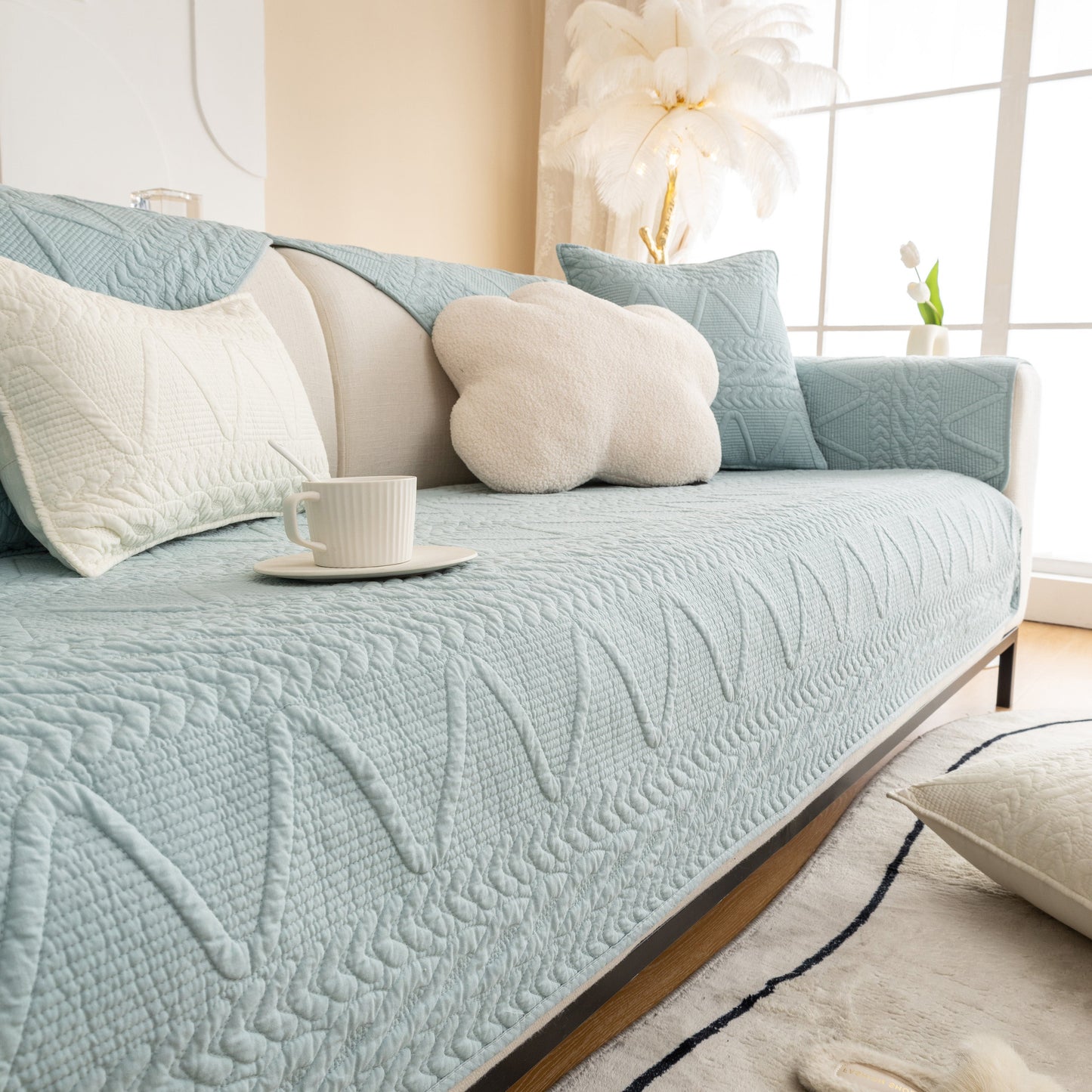 Geometric Textured Cotton Quilted Sofa Cover, Non-Slip Washable Couch Protector on a sofa