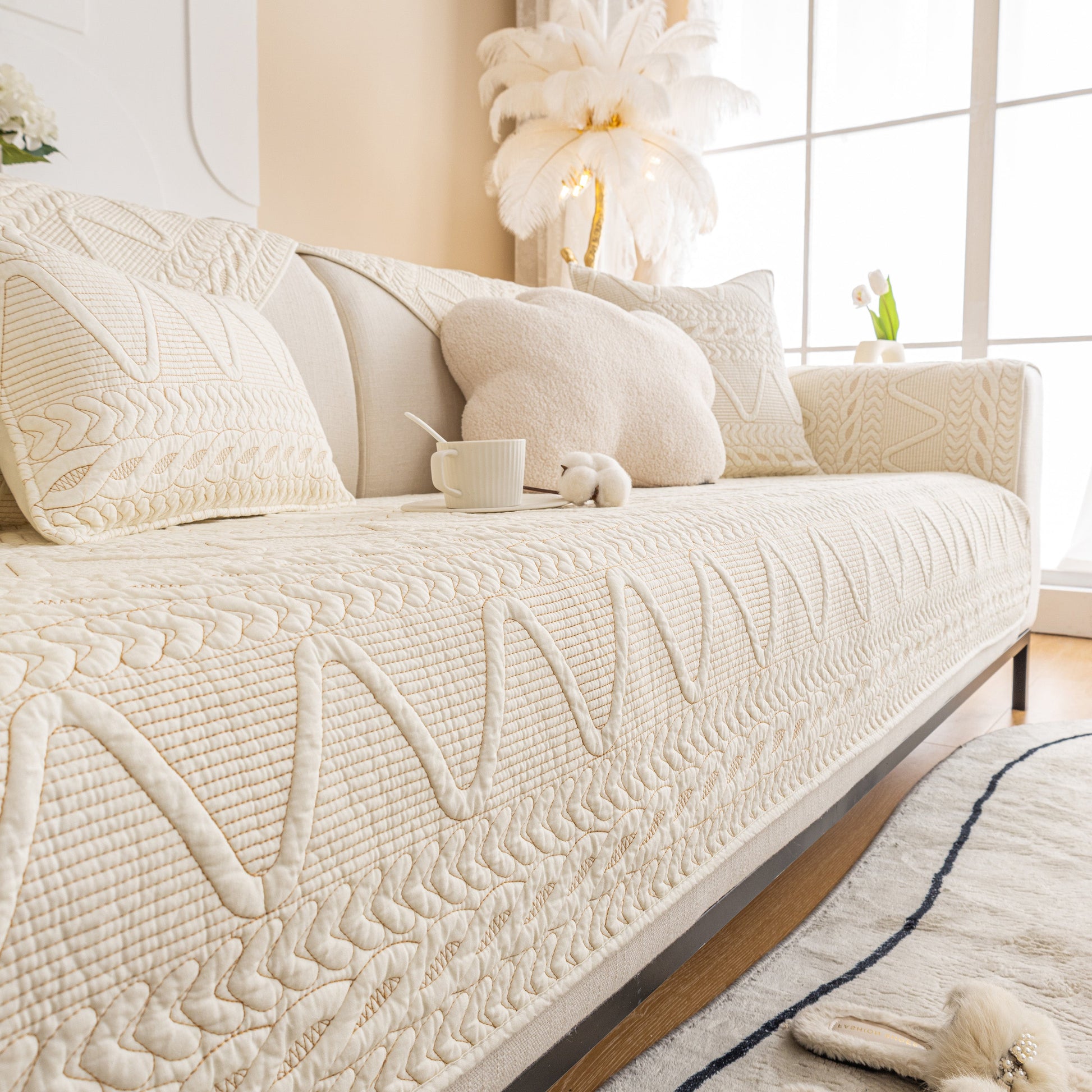Geometric Textured Cotton Quilted Sofa Cover, Non-Slip Washable Couch Protector with modern V-shaped stitching.