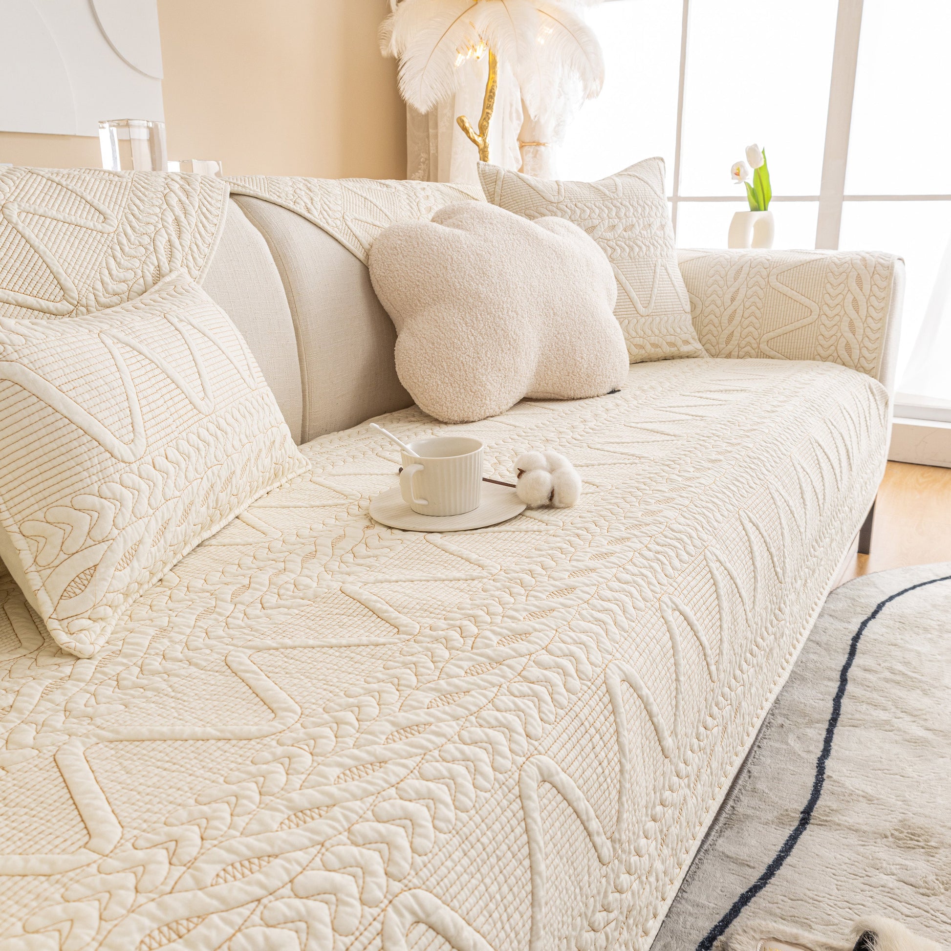 Geometric Textured Cotton Quilted Sofa Cover, Non-Slip Washable Couch Protector on modern beige sofa