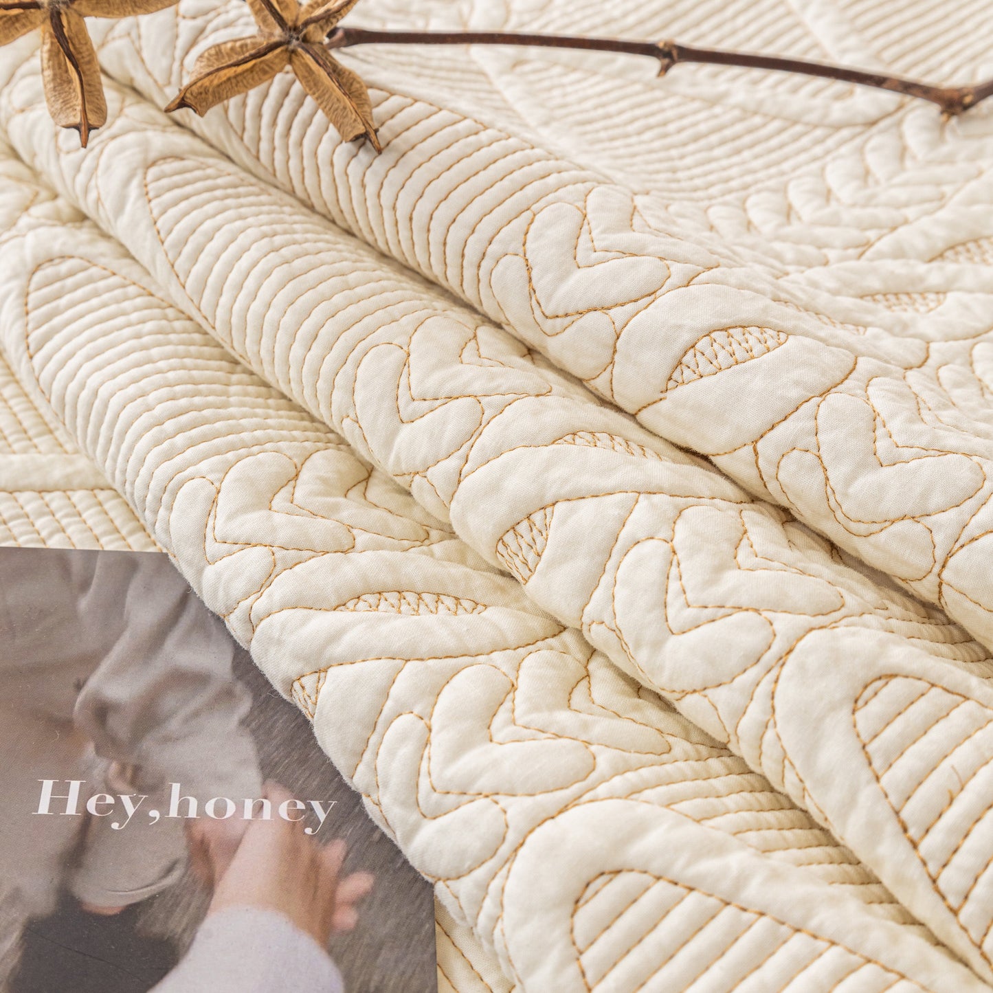 Geometric Textured Cotton Quilted Sofa Cover, Non-Slip Washable Couch Protector with V-shaped stitched patterns.