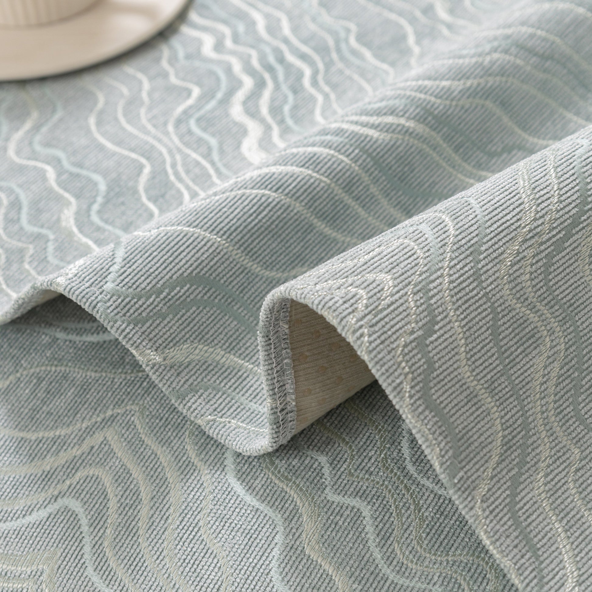 Textured fabric with wave pattern and gold stripes from Modular Sofa Cover for Sectionals, Gold Striped Non-Slip Couch Protector.