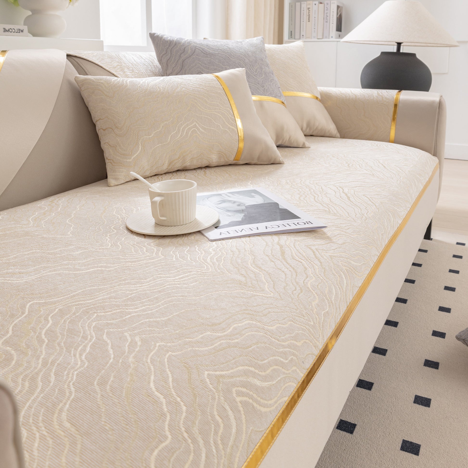 Modular Sofa Cover for Sectionals, Gold Striped Non-Slip Couch Protector with elegant wave pattern and decorative cushions.