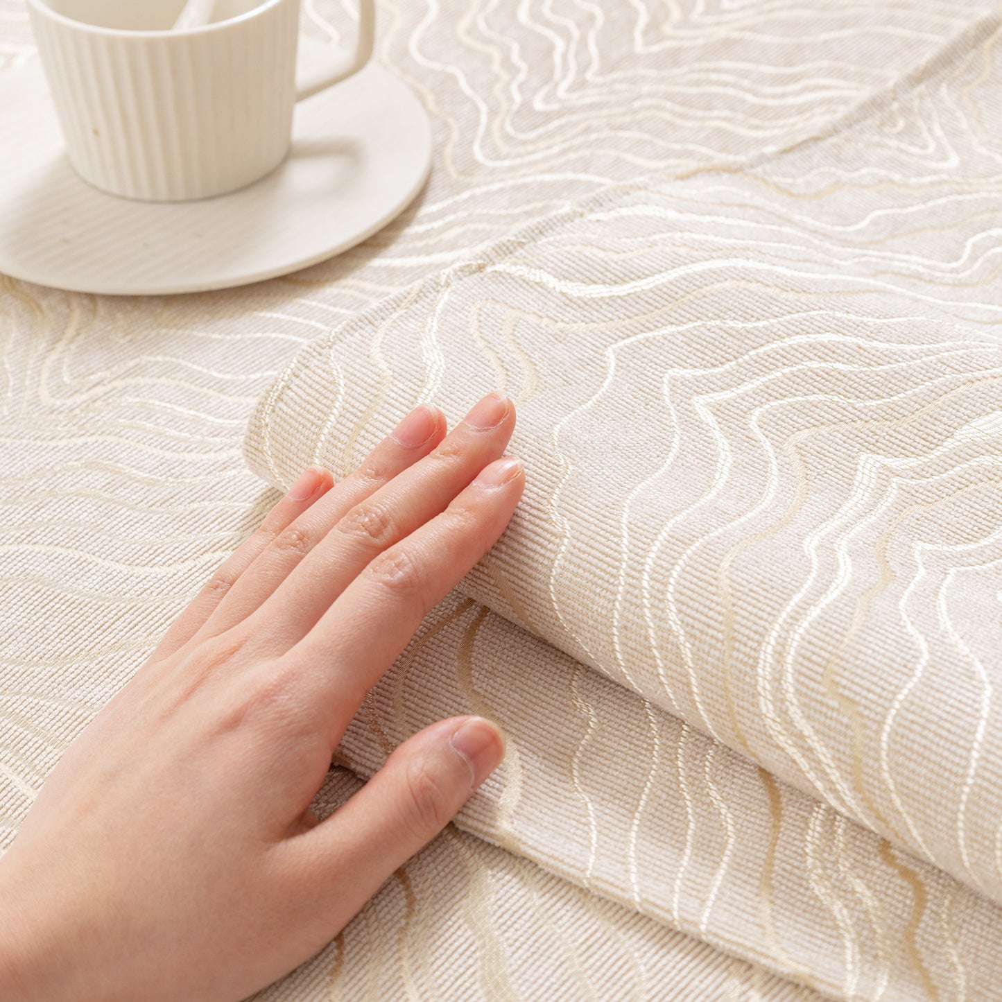 Textured fabric of Modular Sofa Cover for Sectionals, Gold Striped Non-Slip Couch Protector, featuring wave pattern and gold stripes.