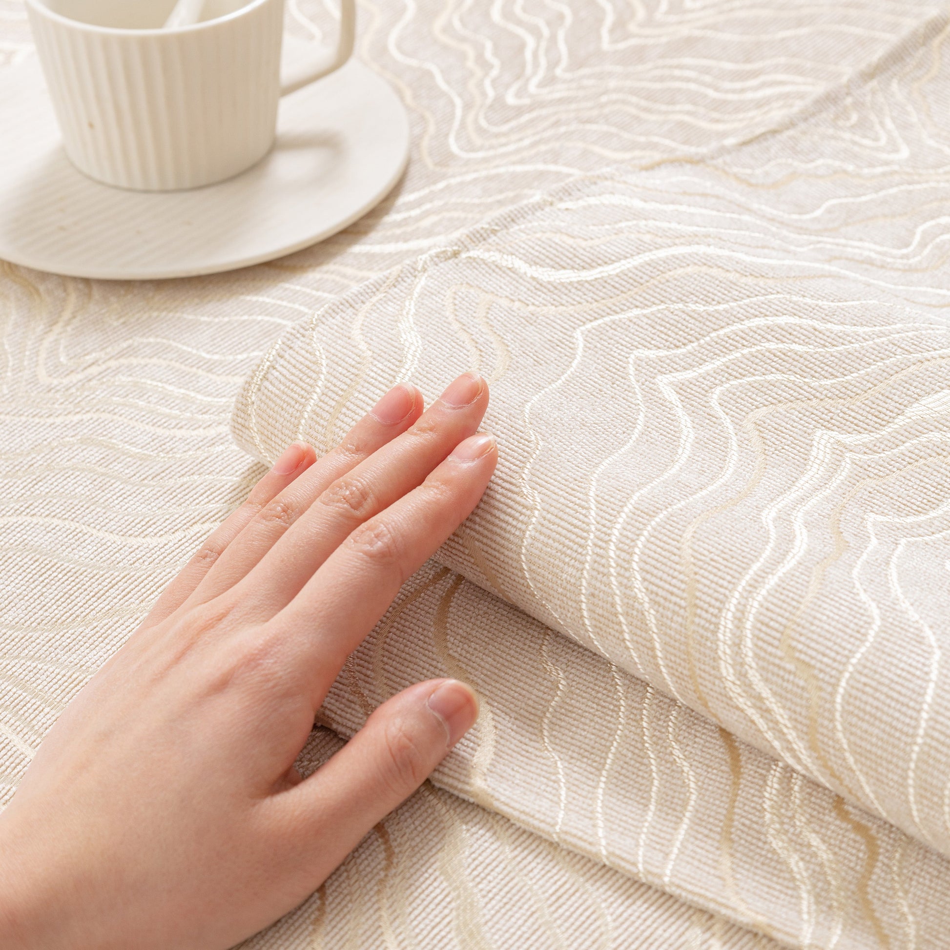 Textured fabric of Modular Sofa Cover for Sectionals, Gold Striped Non-Slip Couch Protector, featuring wave pattern and gold stripes.
