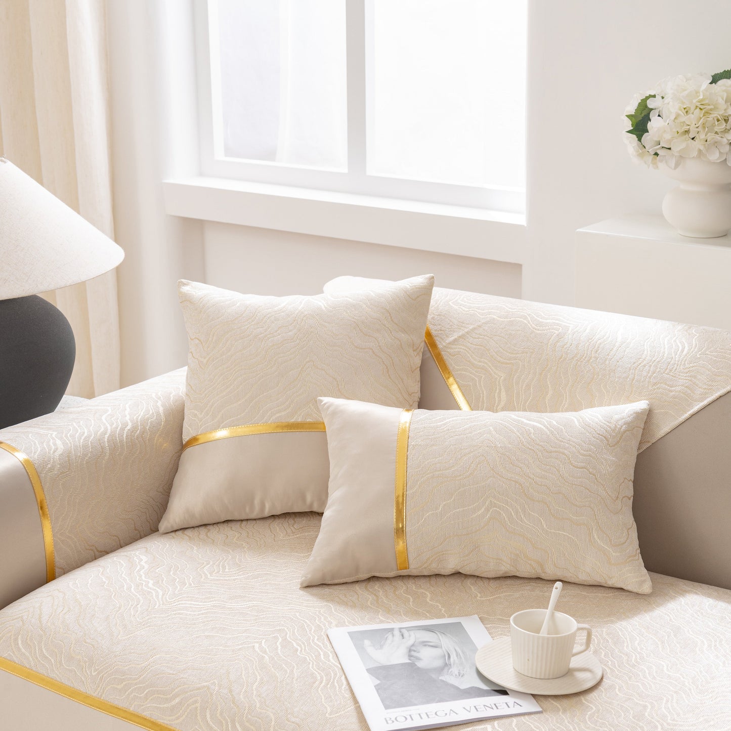 Modular Sofa Cover for Sectionals, Gold Striped Non-Slip Couch Protector on beige couch with wavy pattern and decorative pillows.