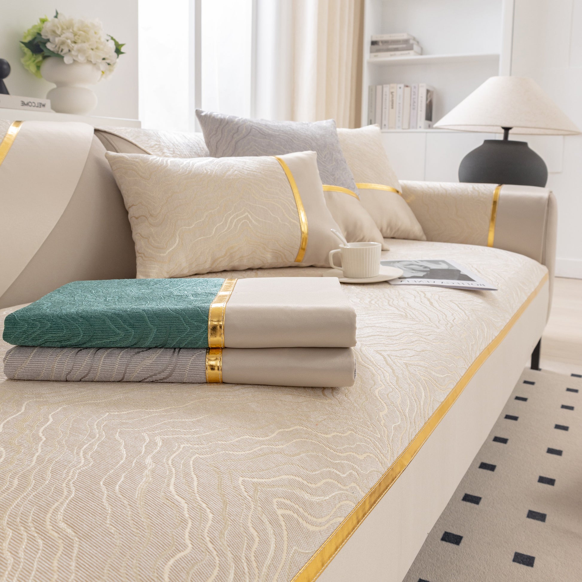 Modular Sofa Cover for Sectionals, Gold Striped Non-Slip Couch Protector with wave pattern and gold accents in a living room setting