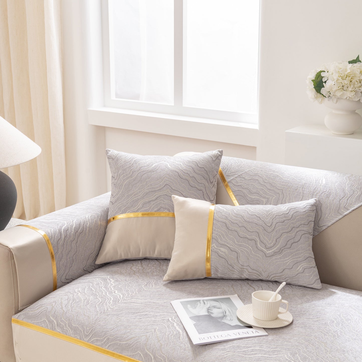 Modular Sofa Cover for Sectionals, Gold Striped Non-Slip Couch Protector with wave pattern and elegant decor in living room setting.