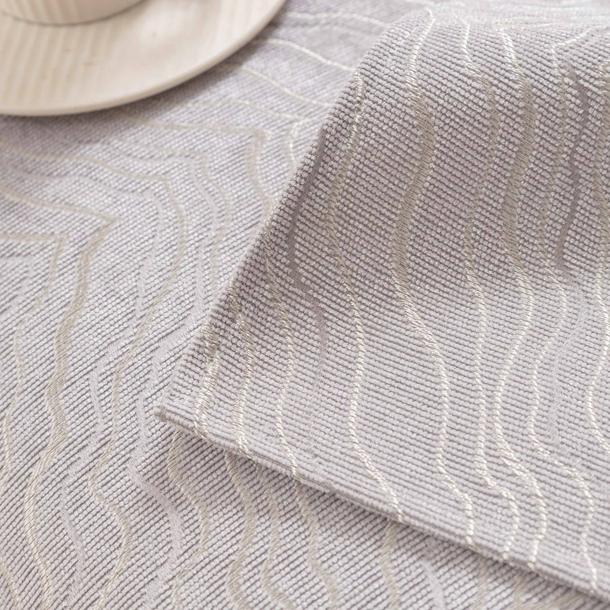 Close-up of Modular Sofa Cover for Sectionals, Gold Striped Non-Slip Couch Protector with wave pattern and elegant gold stripes.