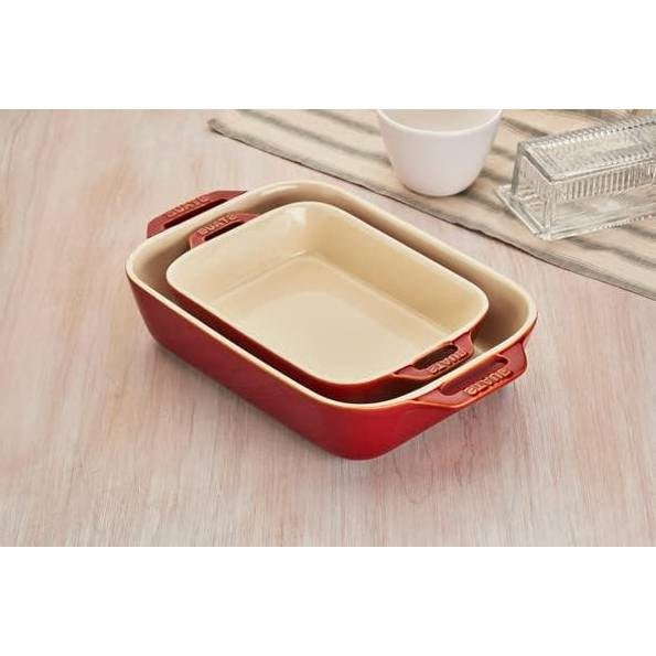 2 Piece Ceramic Stoneware Baking Dish Set in Cherry Red / Ivory on wooden table