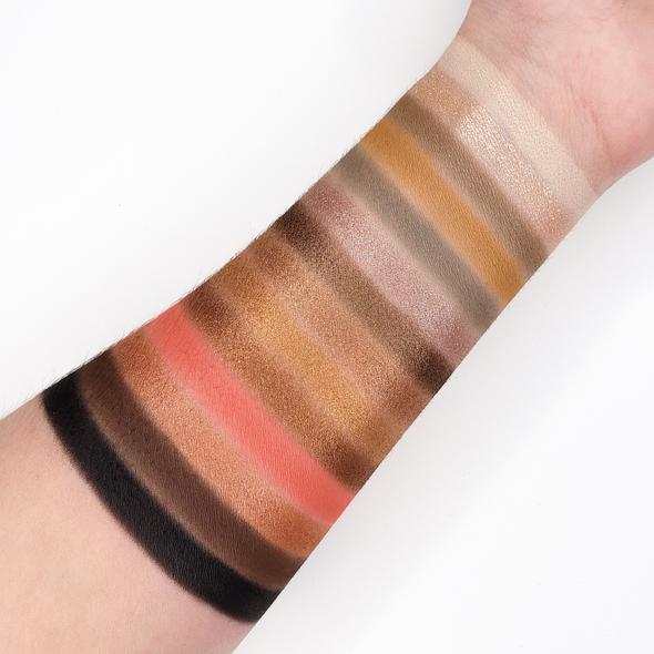 Swatches of eyeshadow shades from the CITY NIGHTS PALETTE 26CN showing warm rose tones and neutrals on a forearm.