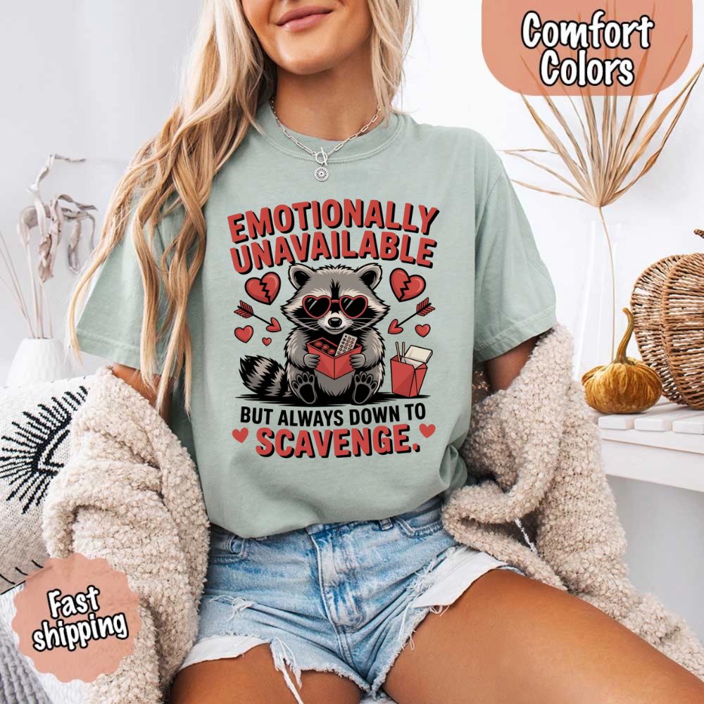 Comfort Colors Emotionally Unavailable Raccoon T-Shirts with moody raccoon design, perfect for those who prefer fun over feelings.