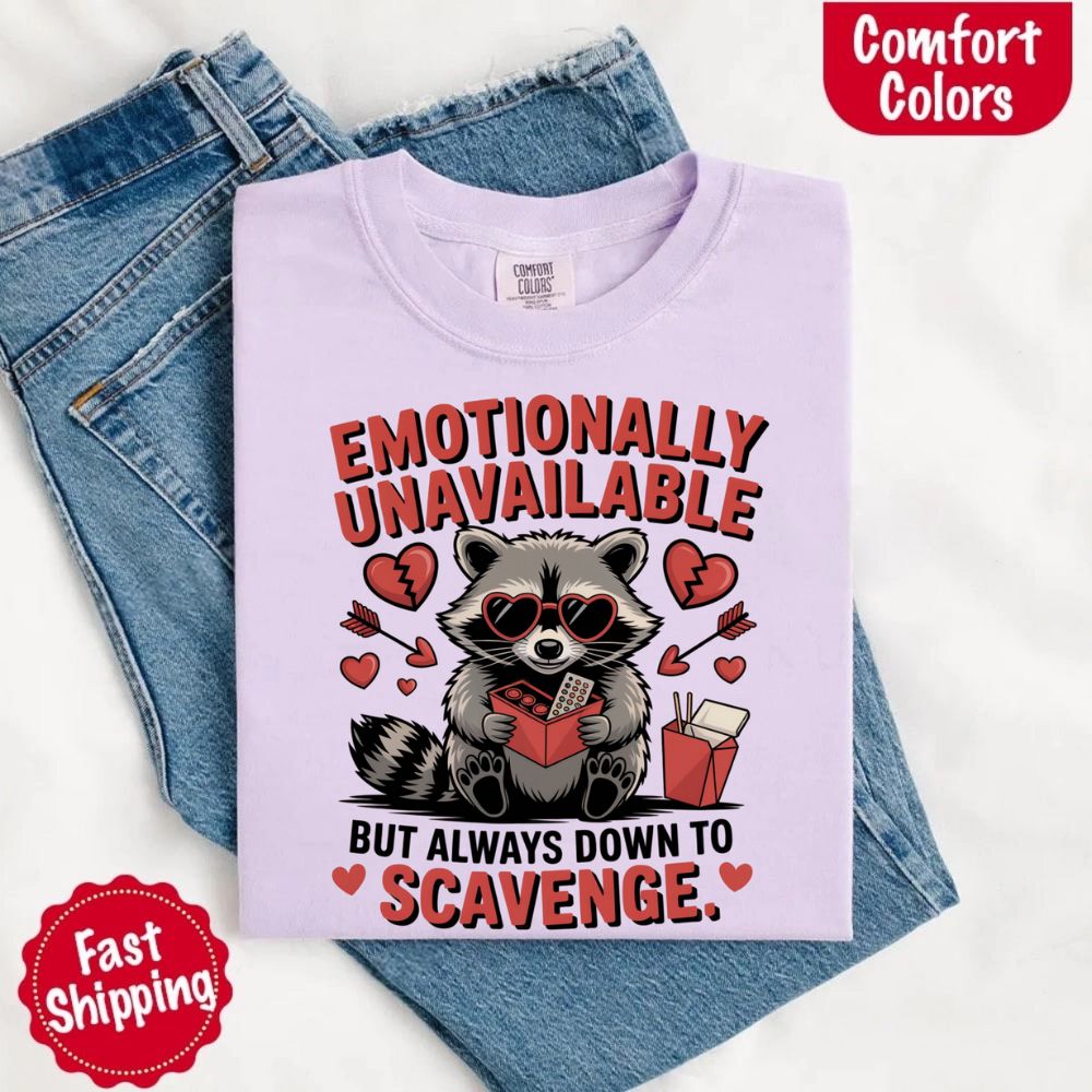 Comfort Colors Emotionally Unavailable Raccoon T-Shirts on jeans with humorous design