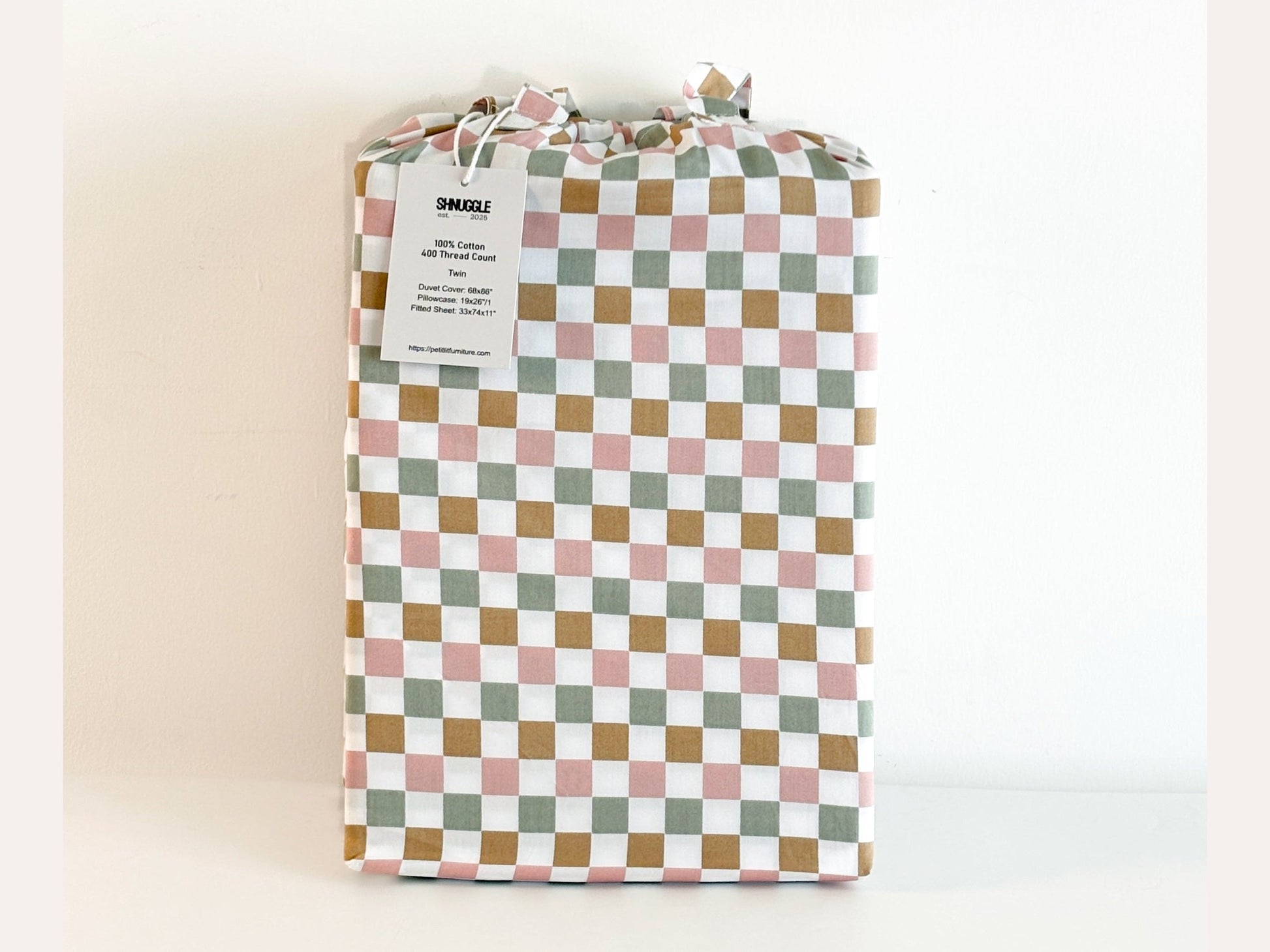 SHNUGGLE Bedding Set Colorful Checker in packaging, showcasing multi-color checker pattern ideal for cozy, stylish bedrooms.