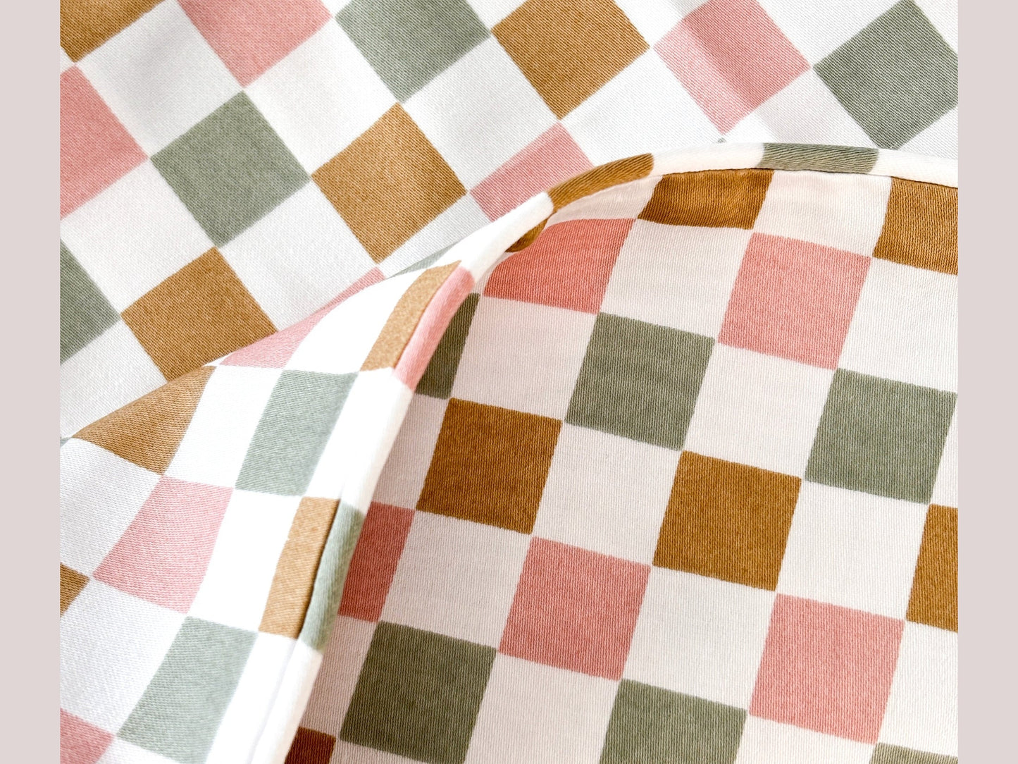 SHNUGGLE Bedding Set Colorful Checker with hidden snaps, featuring soft 400-thread-count cotton in vibrant checker pattern.