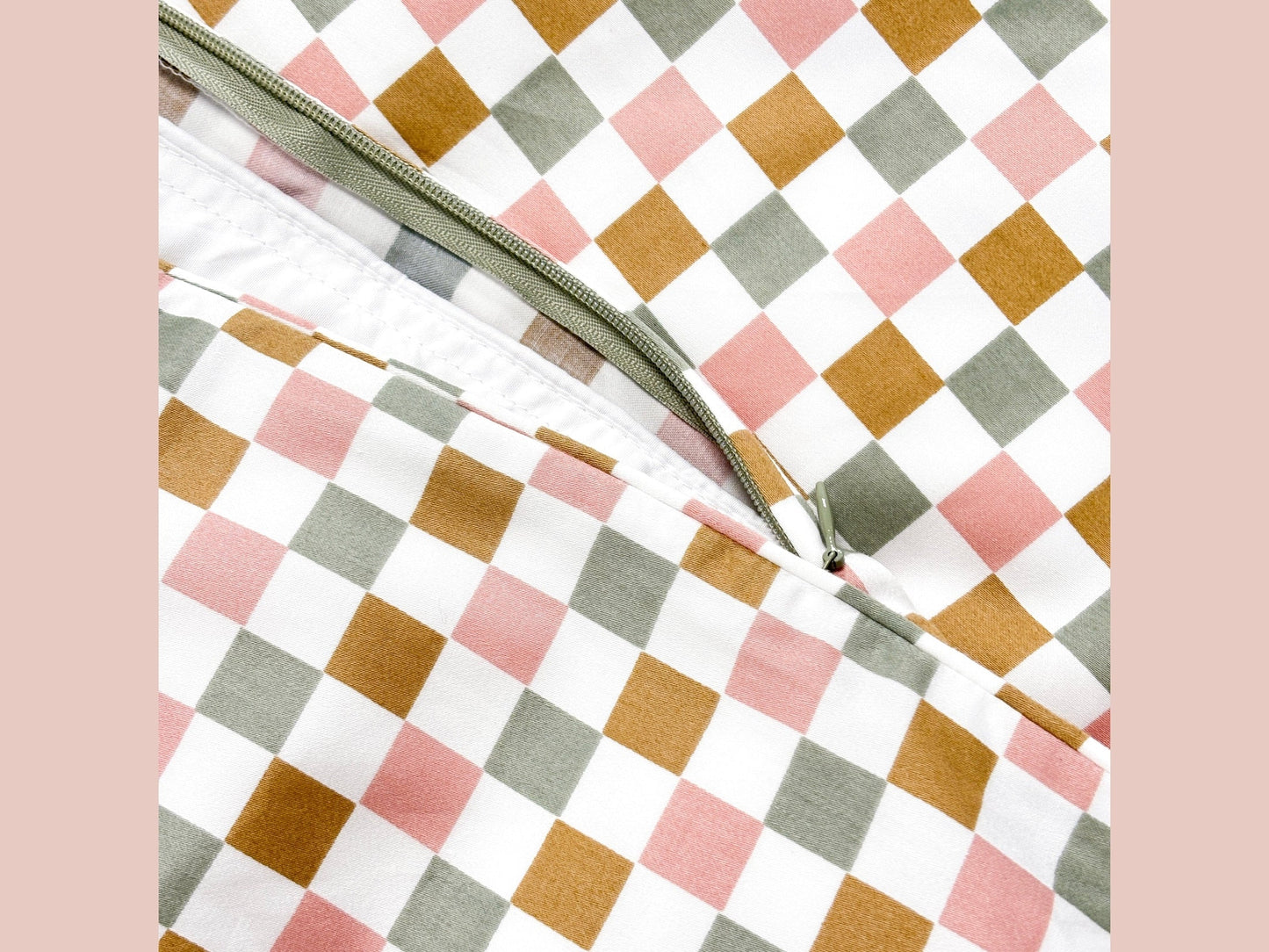 Close-up of SHNUGGLE Bedding Set Colorful Checker pattern with hidden snaps.