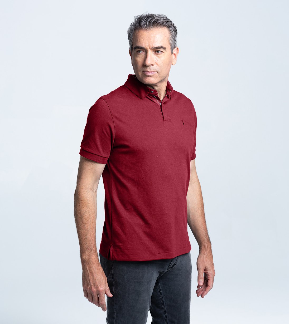 Man wearing Short Sleeve Perfect Polo in red, showcasing StaySharp™ Collar, modern fit, and four-way stretch for comfort.