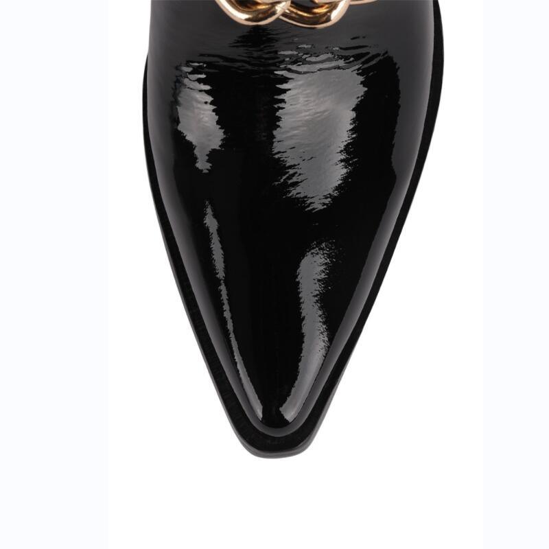Close-up of Knight Studded Cowboy Boots with gold chain buckle, Punk Rock Style with Rivets & Chains, pointed toe detail.