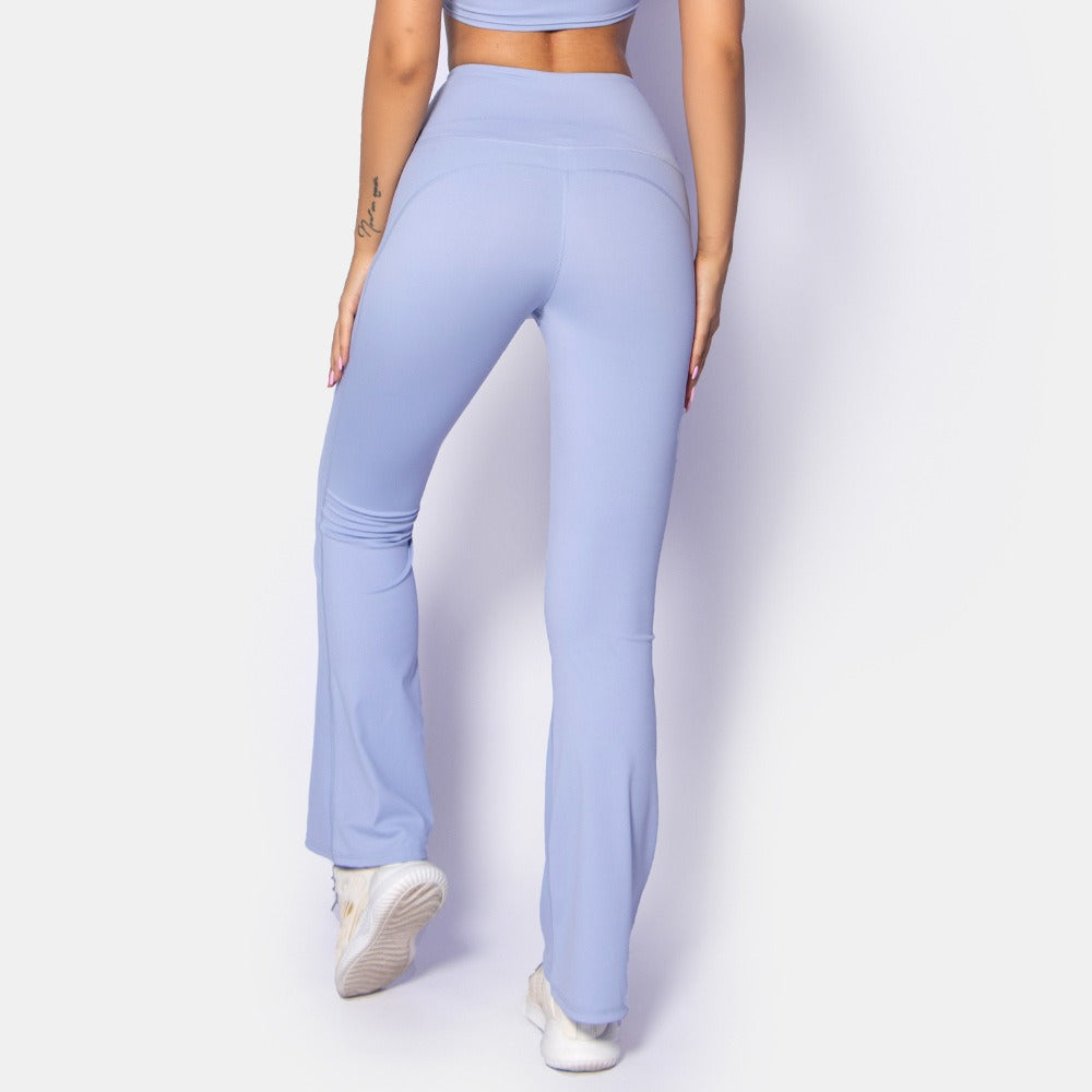 Back view of woman wearing Cloud Sense Wide Leg Pants in light blue, showing comfort, style, and fit for yoga and fitness.