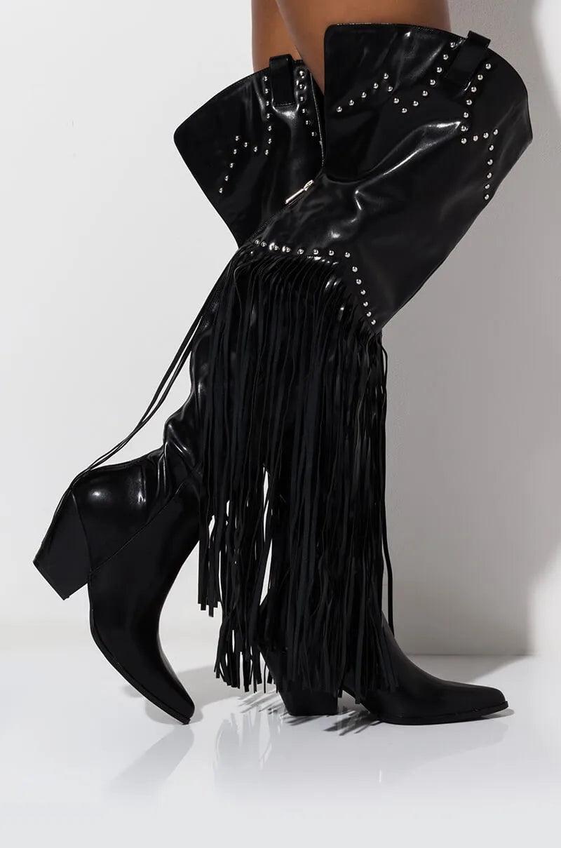 Vintage Fringe Over-the-Knee Boots with Western flair, chunky heel, unique pattern, and flowing fringe detail in black leather.