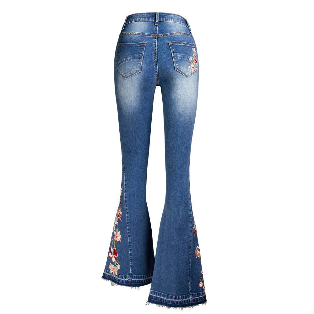 Flared Leg Embroidered Denim Jeans | Cowgirl Style with a Floral Touch, featuring floral embroidery on flared hem and vintage wash finish.
