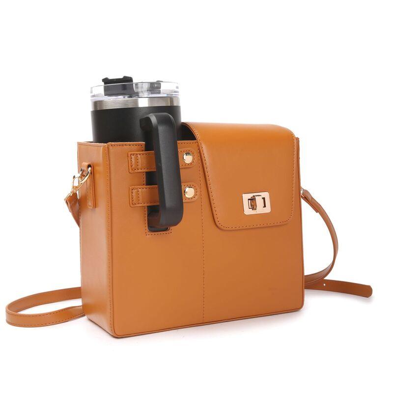 VersaStyle Crossbody Handbags in tan leather with gold hardware and side pocket, showcasing its sleek design and versatile function.