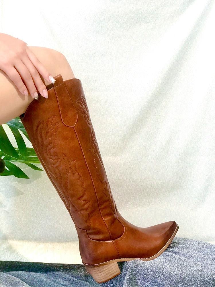 Western Chic Cowboy Boots | Stylish Chunky Heel Knee High Boots for Cowgirls with pointed toe and side zipper, brown leather.