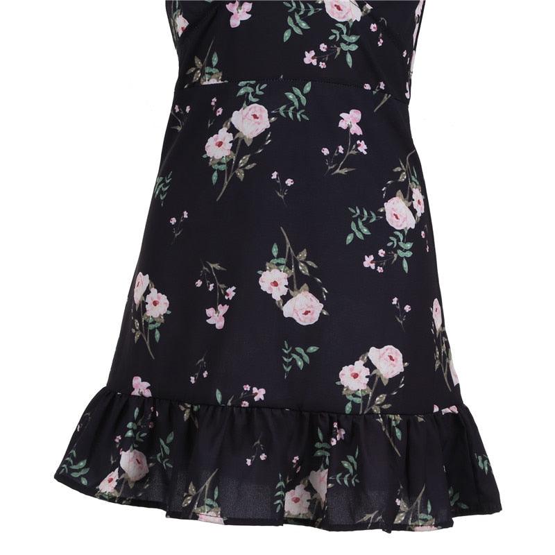 Boho Floral Summer Dress with black base and floral pattern, featuring a ruffled hem, perfect for casual summer outings.