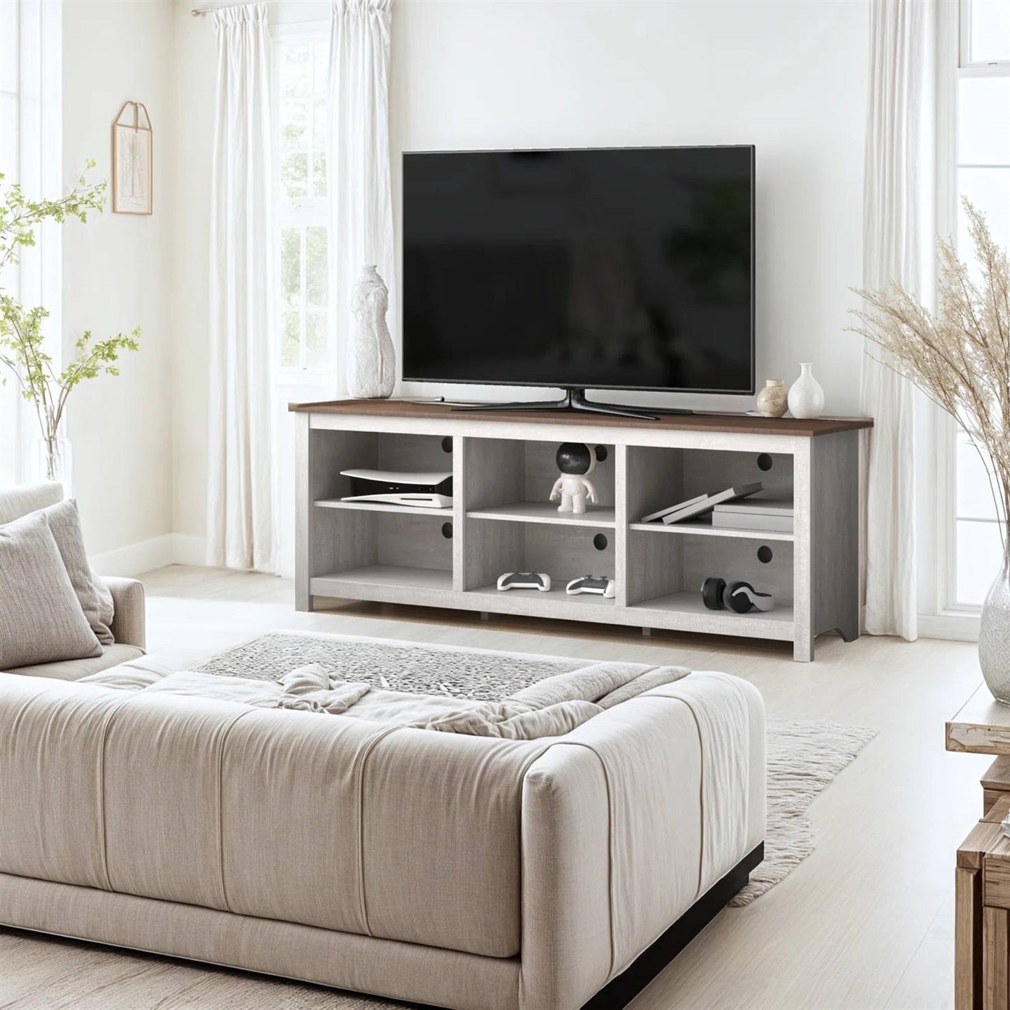 Farmhouse TV Stand in Grey Oak with Brown Wood Finish Top for TVs up to 70-inch in living room setting with decor.