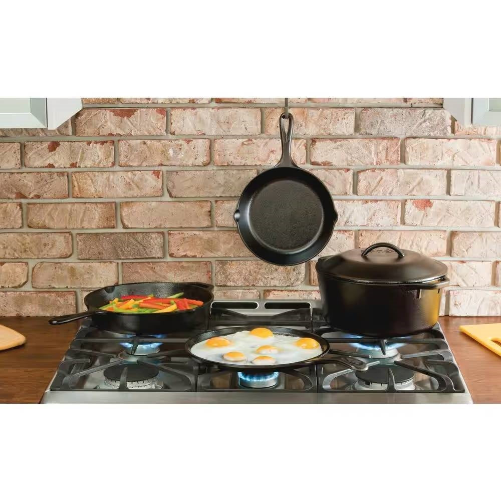 5-Piece Cast Iron Cookware Set with Dutch Oven Griddle and Skillets Made in USA displayed on stove top