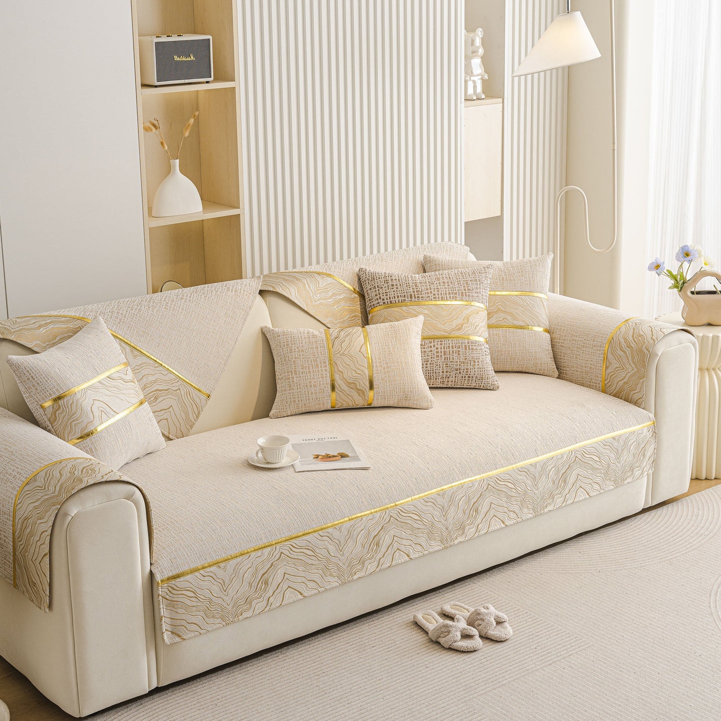Modern Non-Slip Couch Slipcover, Soft, Durable & Washable Furniture Protector with gold marble-style trim on beige chenille fabric.