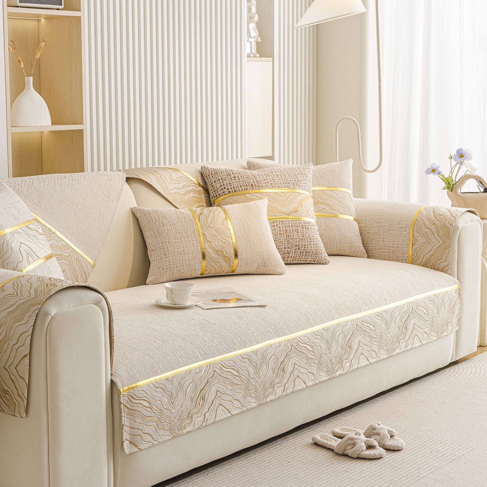 Modern Non-Slip Couch Slipcover, Soft, Durable & Washable Furniture Protector with gold marble trim on a cream sofa