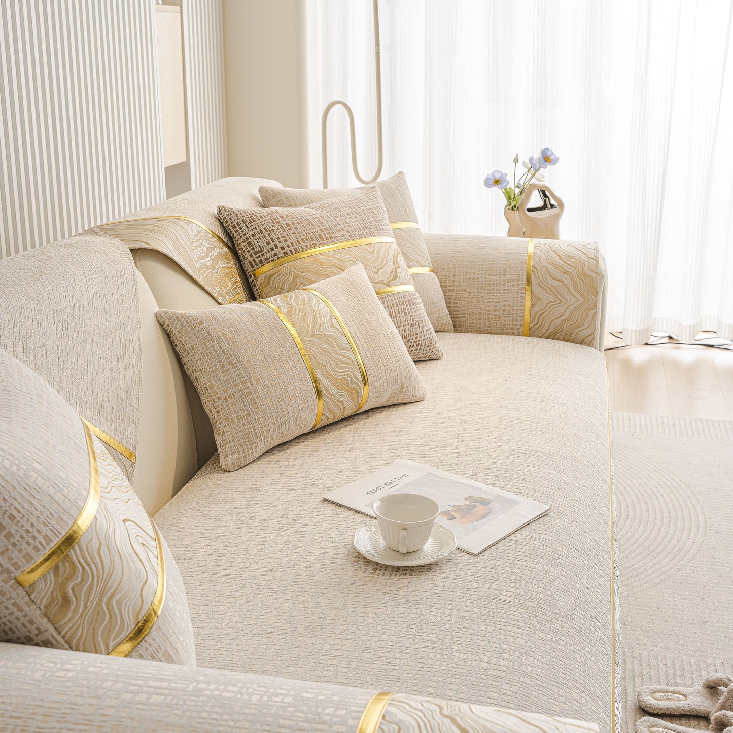 Modern Non-Slip Couch Slipcover, Soft, Durable & Washable Furniture Protector on a sofa with flowing gold marble-style trim.