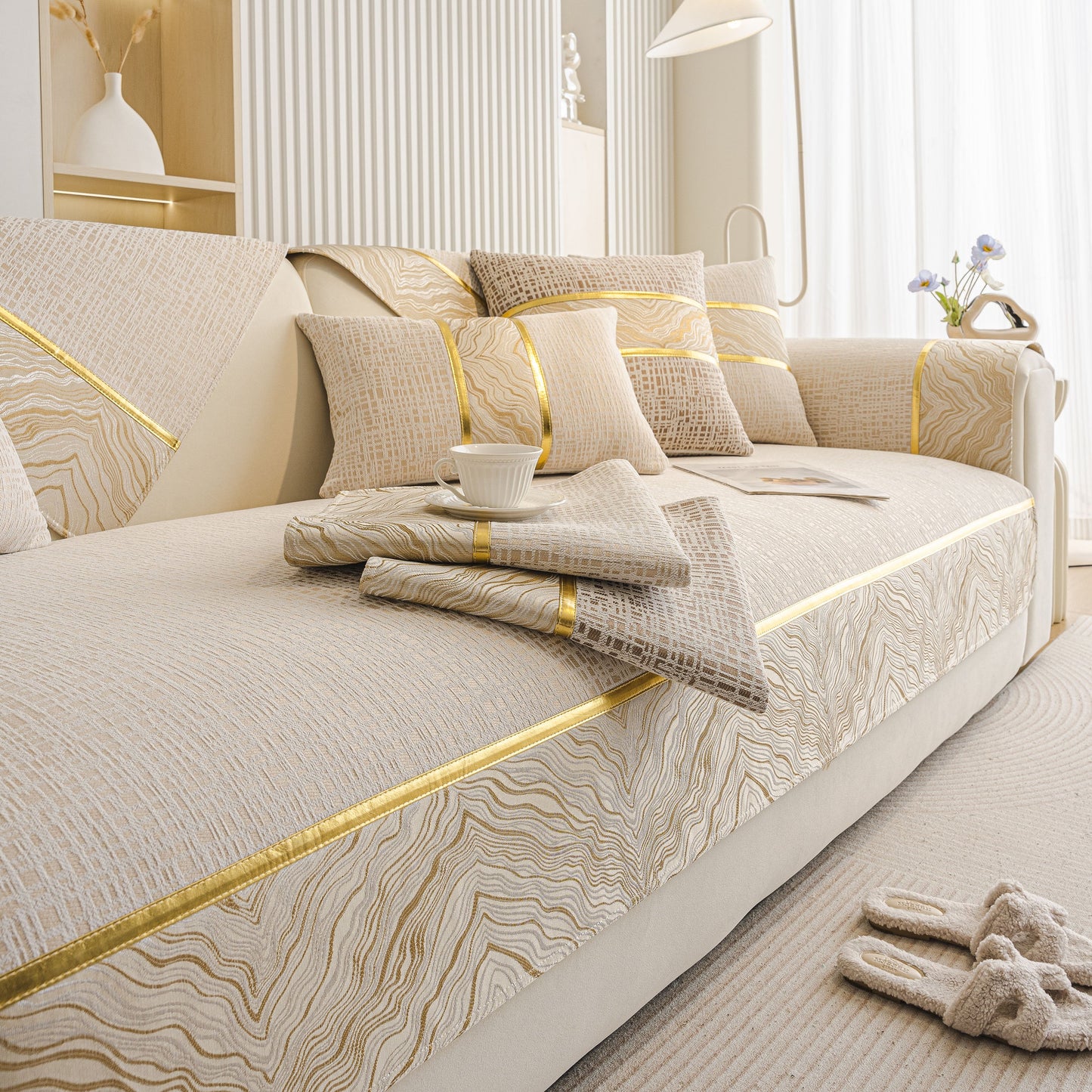 Modern Non-Slip Couch Slipcover, Soft, Durable & Washable Furniture Protector in chenille with gold marble-style trim on sofa