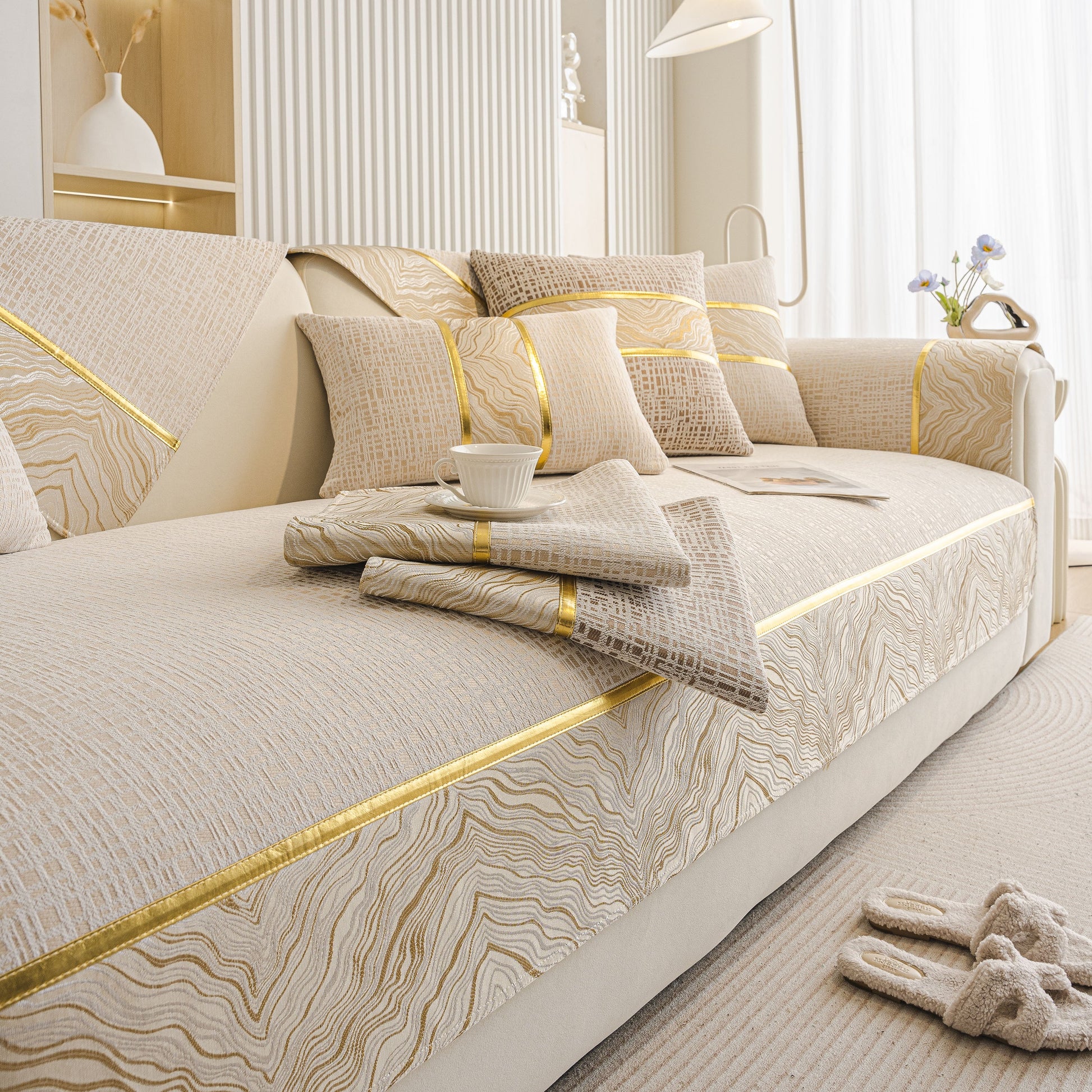 Modern Non-Slip Couch Slipcover, Soft, Durable & Washable Furniture Protector in chenille with gold marble-style trim on sofa