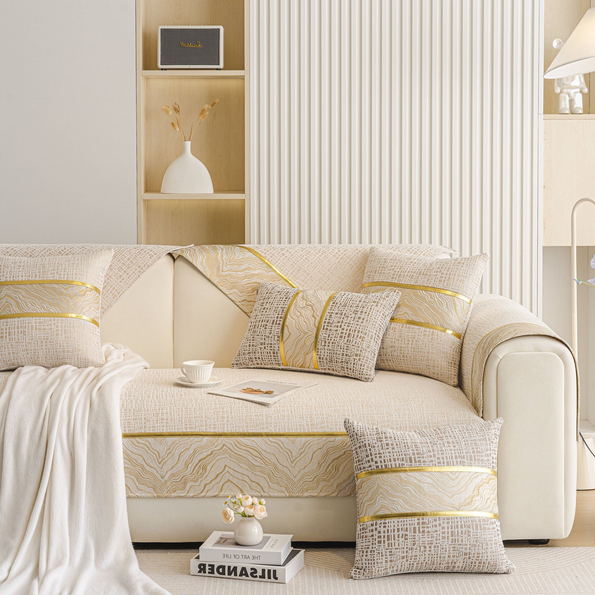 Modern Non-Slip Couch Slipcover, Soft, Durable & Washable Furniture Protector on stylish sofa with gold marble trim.