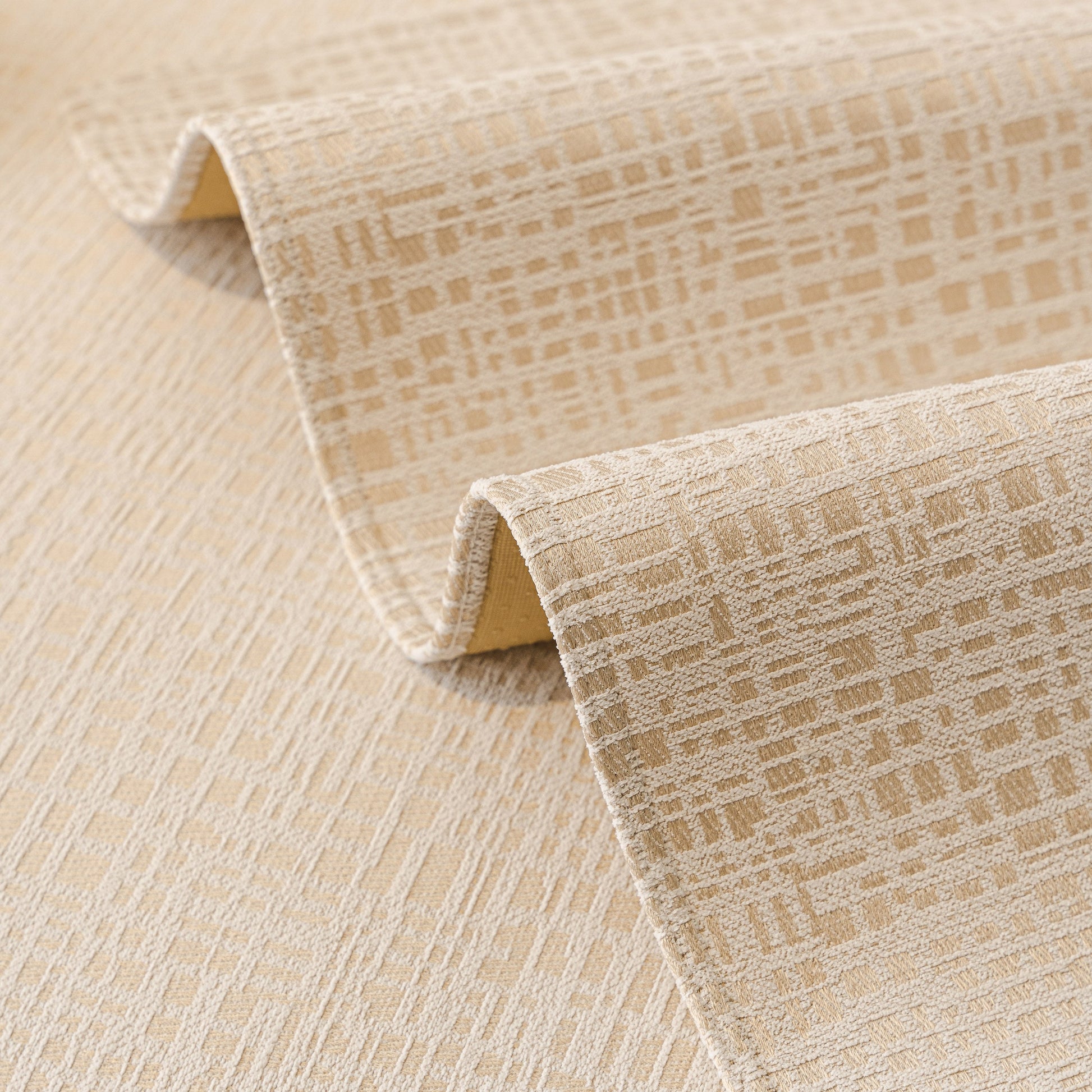 Close-up of chenille fabric texture from Modern Non-Slip Couch Slipcover, Soft, Durable & Washable Furniture Protector with marble-style trim.