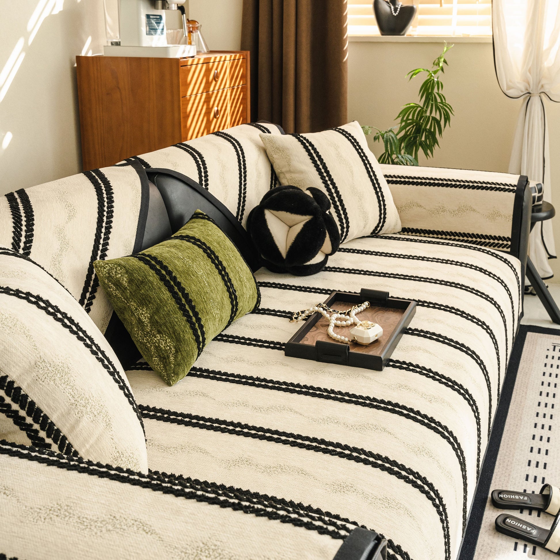 Non-Slip Sofa Cover with Thick Chenille Texture Woven Stripe Couch Protector Throw on modern living room sofa.