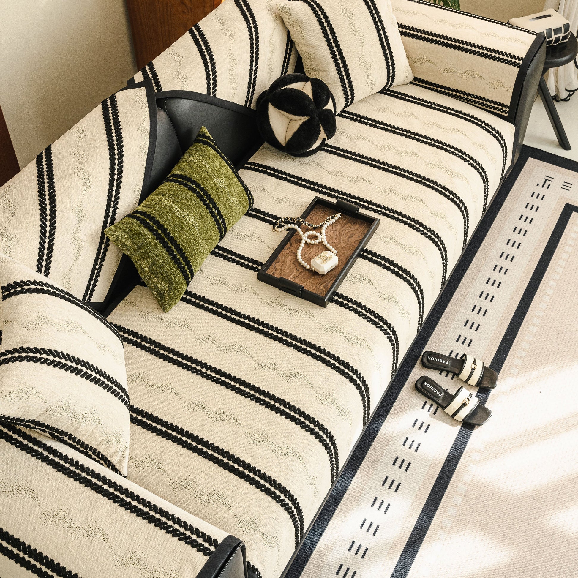 Non-Slip Sofa Cover with Thick Chenille Texture Woven Stripe Couch Protector Throw on living room couch with decorative pillows