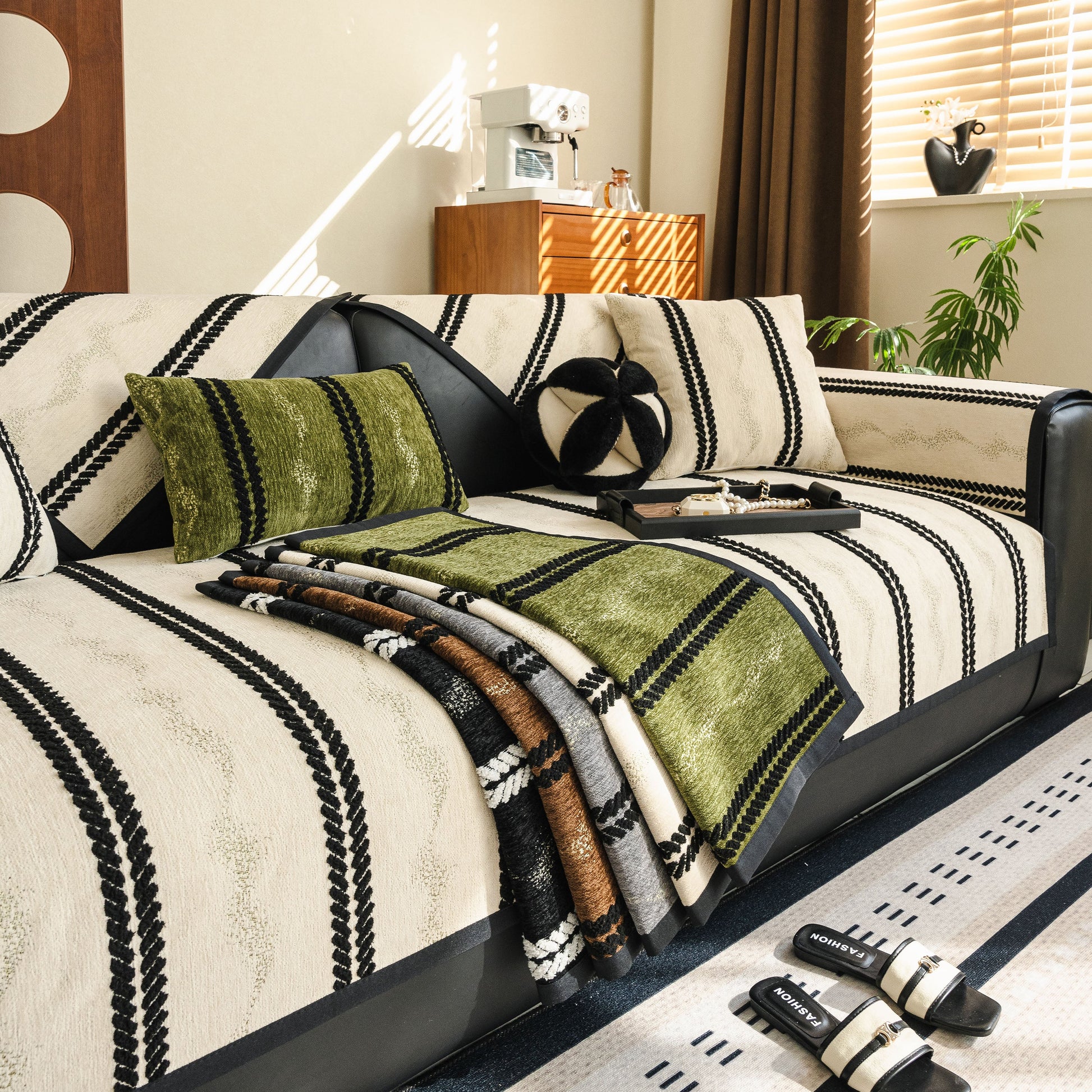 Non-Slip Sofa Cover with Thick Chenille Texture Woven Stripe Couch Protector Throw on a stylish couch in a modern living room