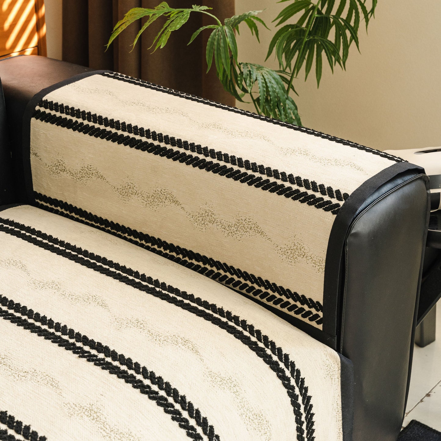 Non-Slip Sofa Cover with Thick Chenille Texture Woven Stripe Couch Protector Throw on a leather couch