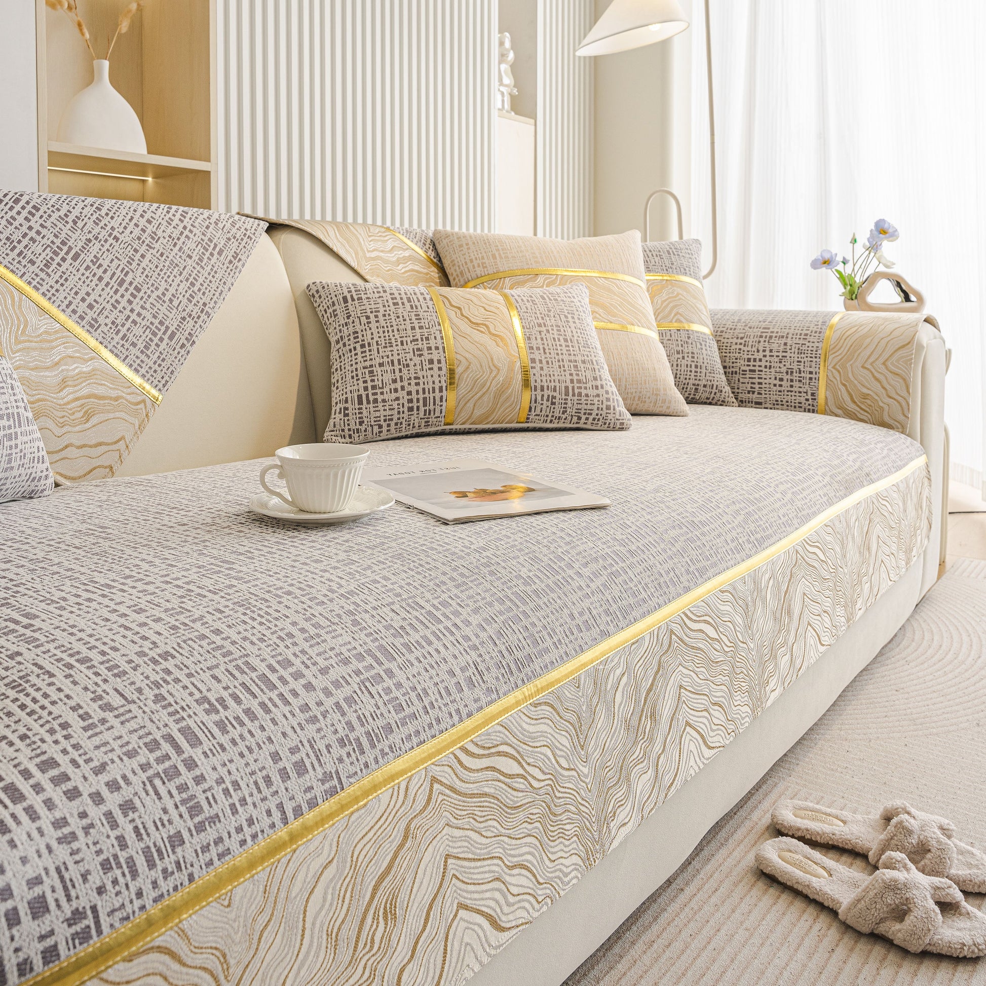 Modern Non-Slip Couch Slipcover, Soft, Durable & Washable Furniture Protector with gold marble-style trim for elegant decor.